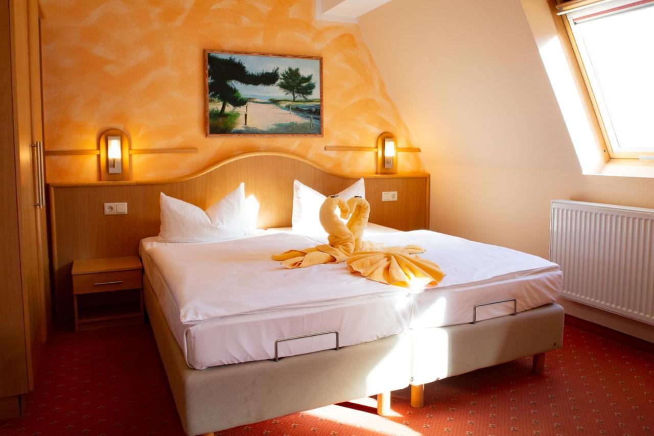 Pension Erdmann - Hotel Garni ゼーバート・ヘリングスドルフ エクステリア 写真